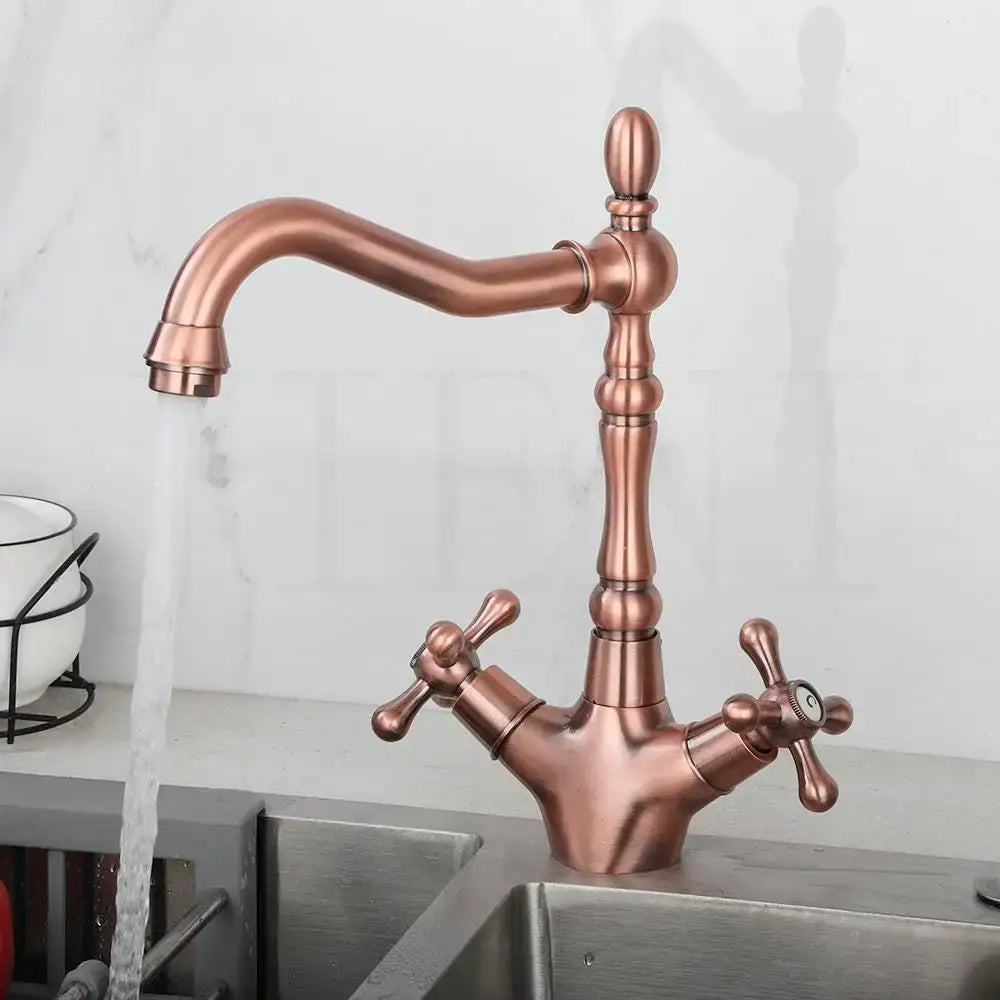Antique brass dual handle swivel sink faucet with copper finish and vintage cross-shaped handles by decorbites