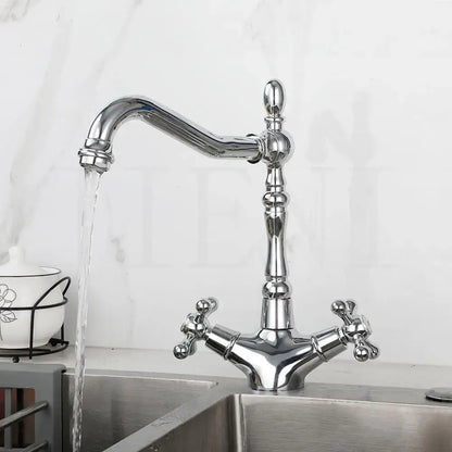 Chrome-finished vintage dual handle kitchen faucet with ornate detailing and cross-shaped handles for antique brass dual use