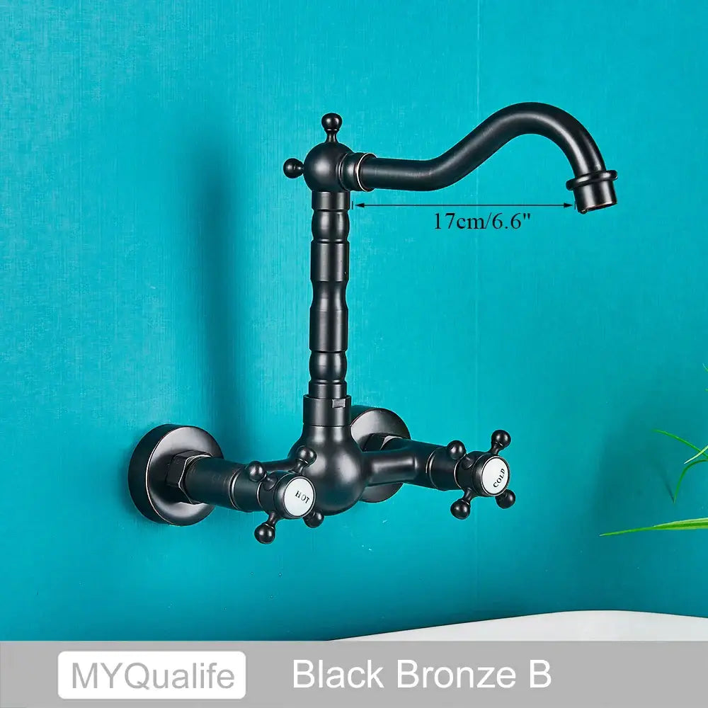 DecorBites™ antique brass dual handle kitchen faucet with black bronze farmhouse curved spout and cross-handle knobs wall mounted