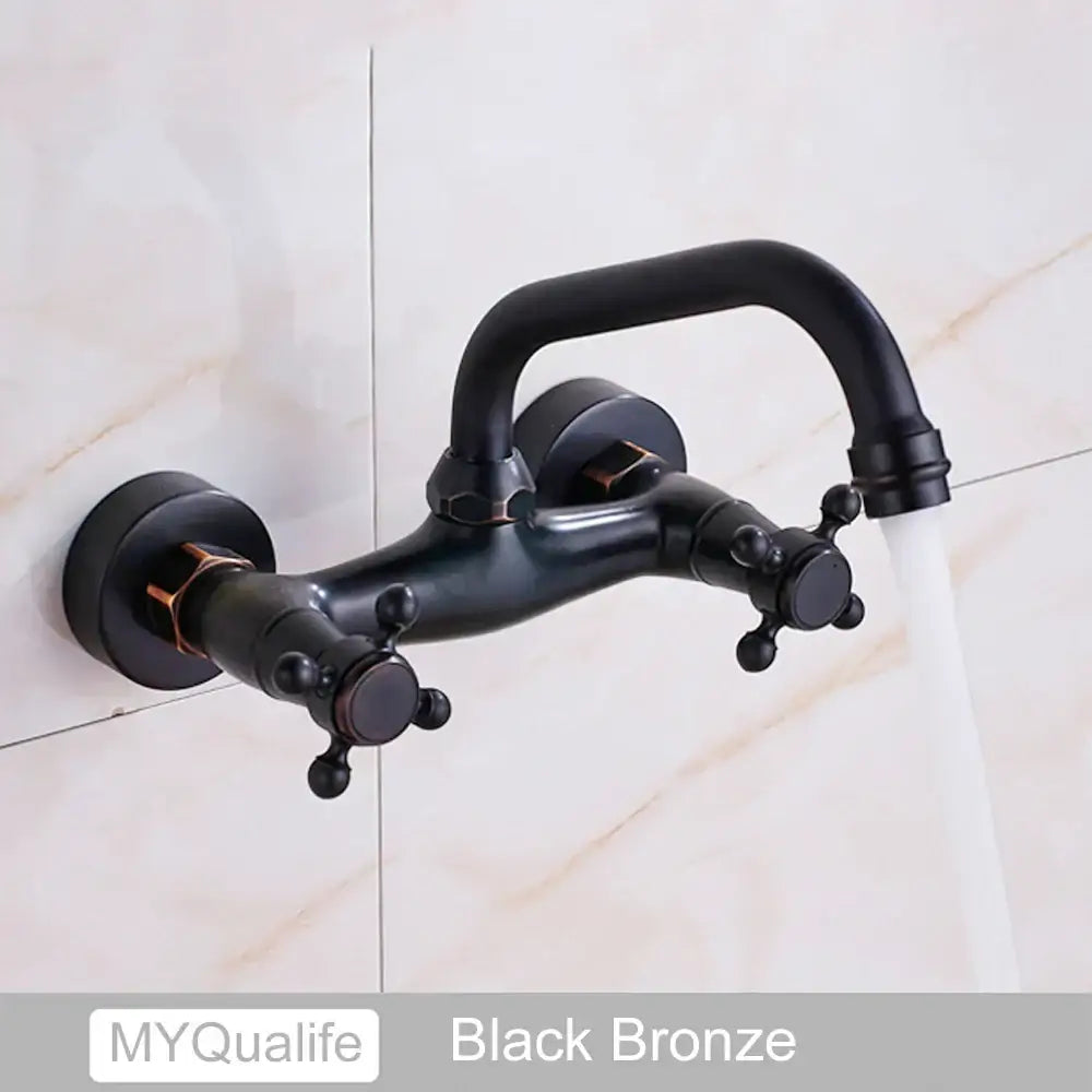 DecorBites™ antique brass dual handle kitchen faucet with black bronze finish and sleek curved spout wall-mounted design