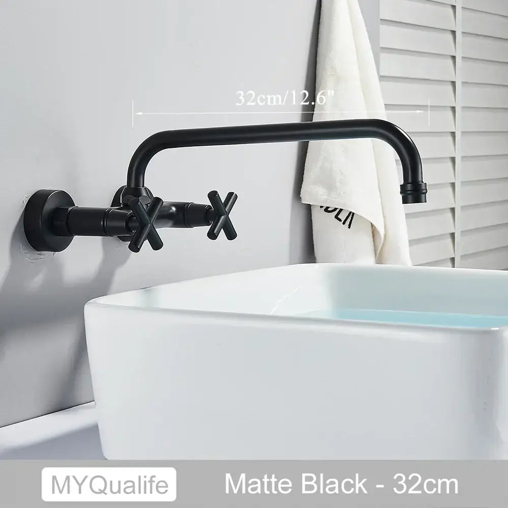 Matte black wall-mounted kitchen faucet with dual handle cross-shaped design from decorbites antique brass collection