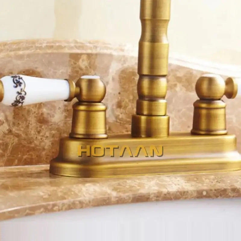 DecorBites™ antique brass dual basin faucet mixer tap with three handles including ceramic floral detail for bathroom sink
