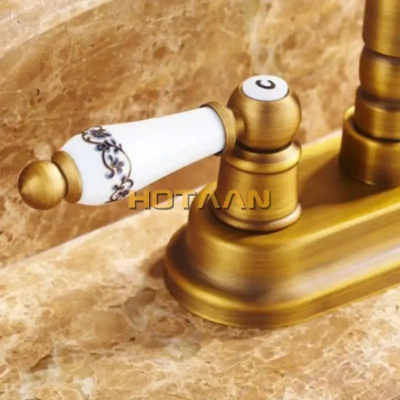 DecorBites antique brass dual hole basin faucet mixer tap with white ceramic handle and blue floral pattern knob c