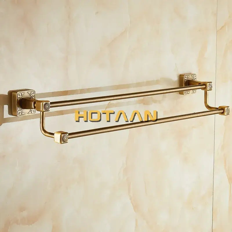 DecorBites™ antique brass finish double towel bar with brass ornate square wall mounts and decorative end caps