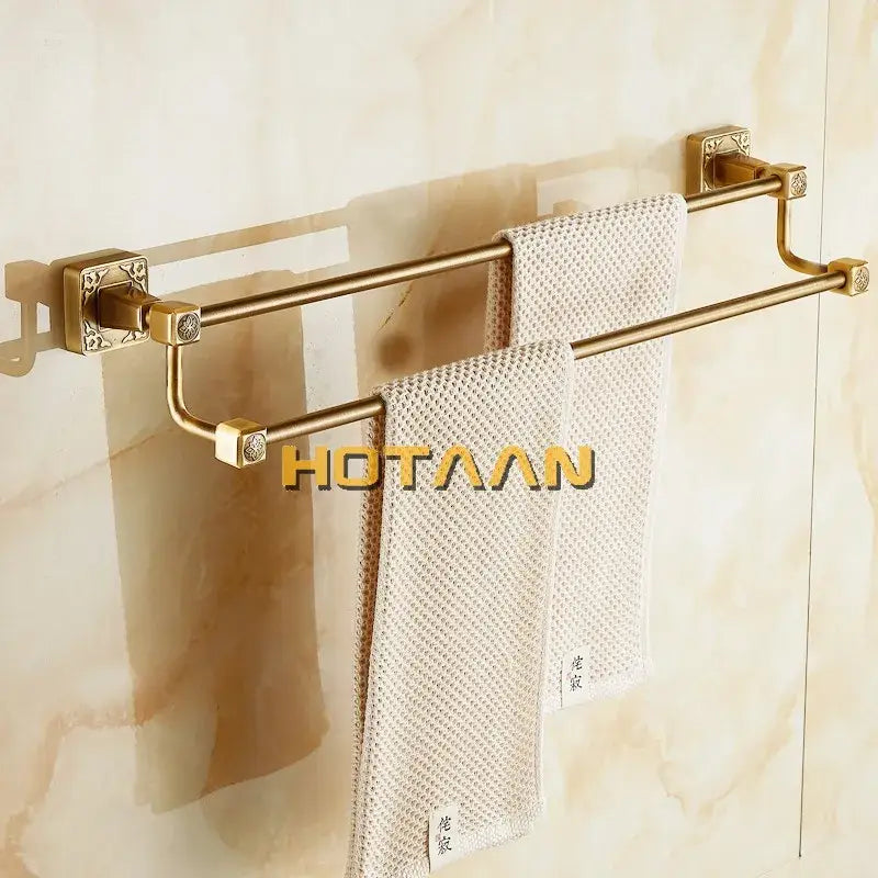Decorbites™ antique brass finish double towel bar with gold-finished solid aluminium and ornate square brackets