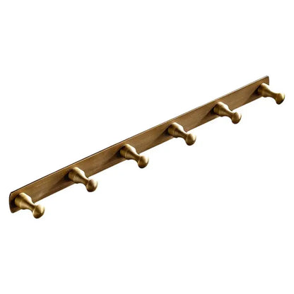 Gold-toned metal wall-mounted coat rack with five rounded pegs in antique brass finish robe hook for bathroom accessories