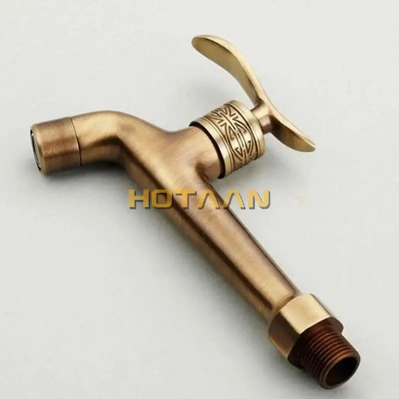 DecorBites antique brass finish wall mount bibcock faucet with ornate engraved handle and decorative band for bathroom use