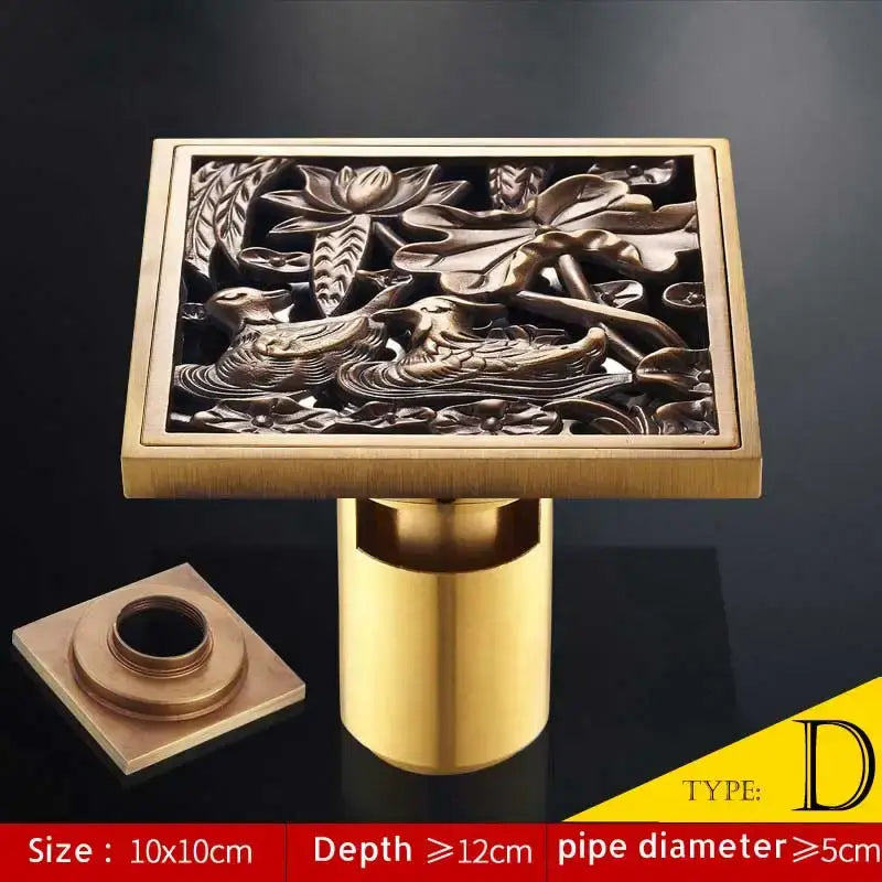 Brass square shower drain with intricate lotus and duck relief in antique brass fish style by decorbites