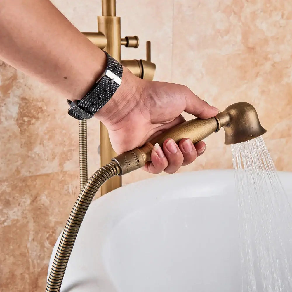 Brass handheld showerhead with textured grip and flexible hose for decorbites antique brass swivel spout mixer tap