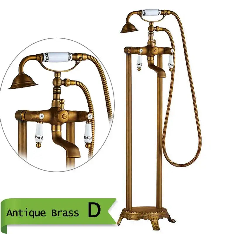 Decorbites™ antique brass freestanding bathtub filler with hand shower featuring white ceramic handles and decorative base