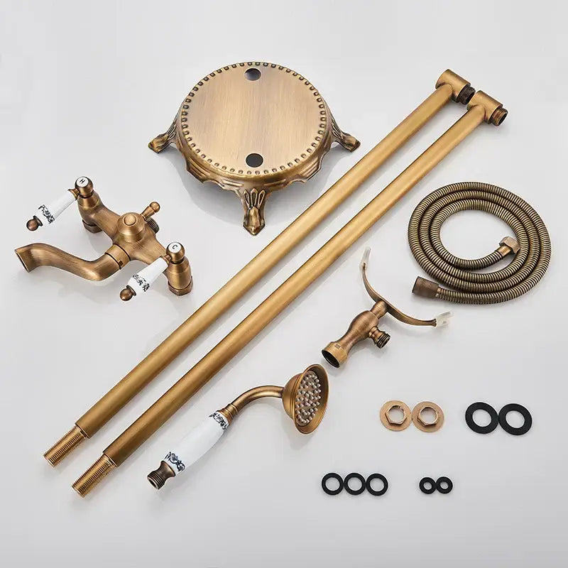 DecorBites™ antique brass freestanding bathtub faucet set with ornate detailing and ceramic handles with hand shower