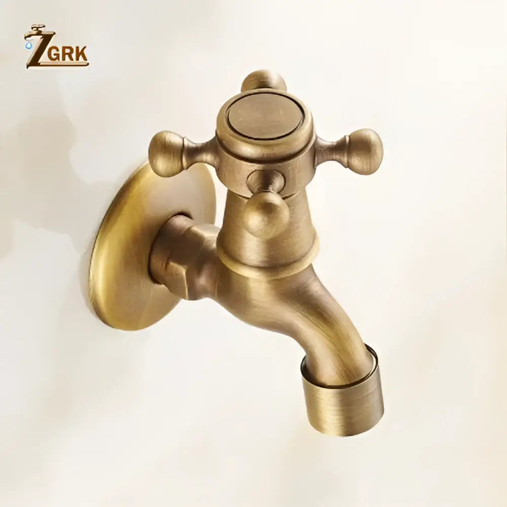 Antique brass garden bibcock tap with cross handle and rounded spout for bathroom and outdoor use by DecorBites