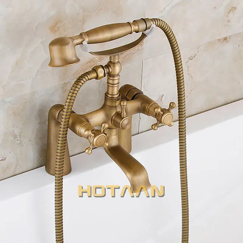 Decorbites™ antique brass hand held shower head kit featuring a classic bathtub faucet with two cross-handle knobs