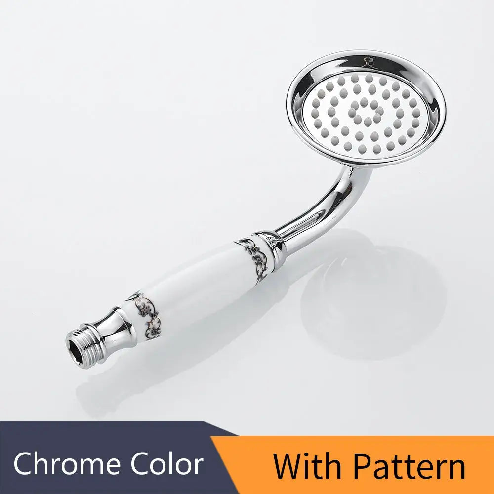 Decorbites™ antique brass hand held shower with chrome finished head and white ceramic handle with black floral patterns