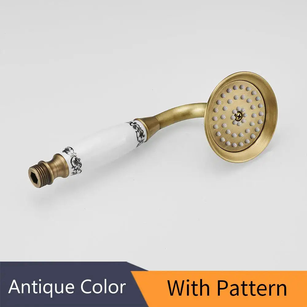 Decorbites antique brass hand held shower with luxury ceramics featuring white ceramic handle with black ornate patterns