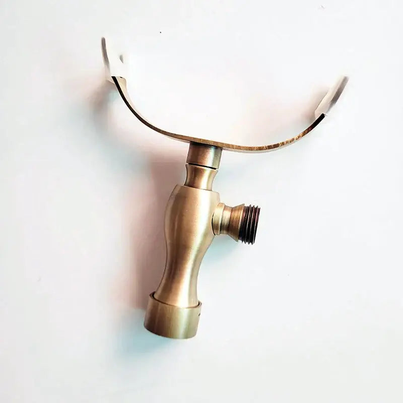 DecorBites antique brass hand shower holder bracket with brass-colored curved faucet and integrated handle for wall mount