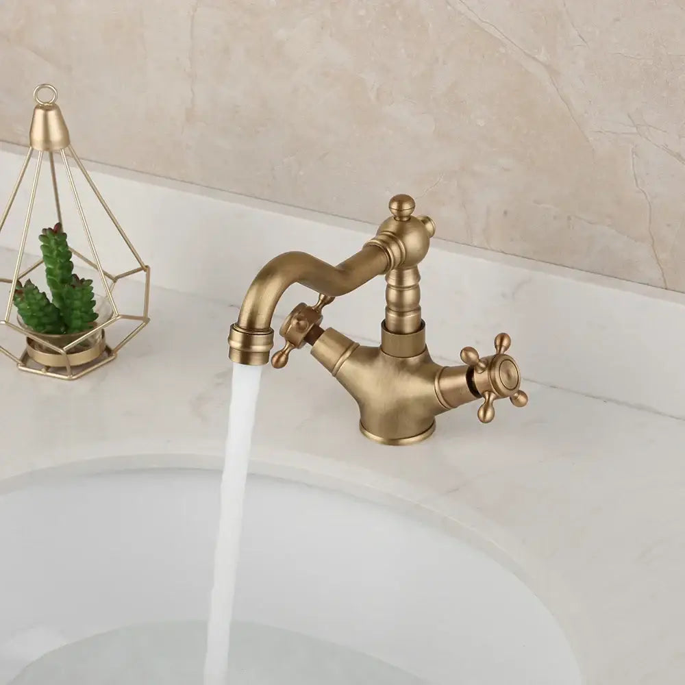 Decorbites™ antique brass kitchen bathroom faucet with ornate cross handles and curved swivel spout deck mount