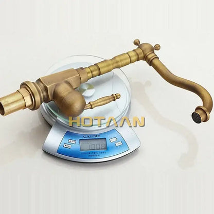 Antique brass kitchen faucet decorbites with curved spout ornate handles and 360° swivel basin sink mixer tap yt-6025