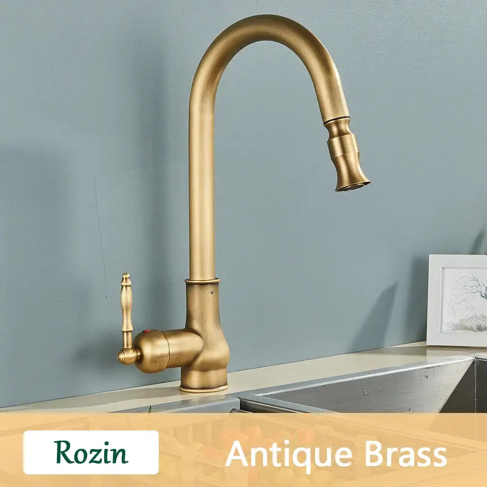 Antique brass kitchen faucet by decorbites with curved pull out spout and ornate handle in black swivel mixer tap design