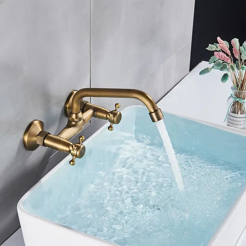 Decorbites antique brass kitchen faucet with double handles swivel spout and ornate cross-shaped brass design