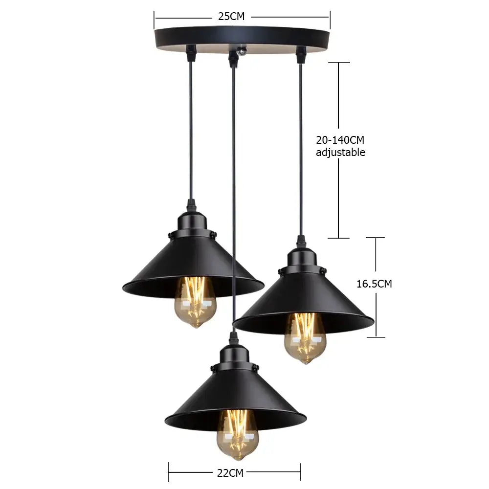 Black metal pendant light fixture with three conical shades and exposed filament bulbs for antique brass kitchen pendant
