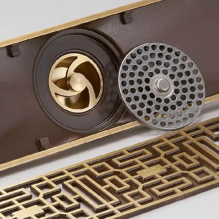 Bronze and silver metal drain grates with intricate geometric patterns for decorbites antique brass linear floor drain