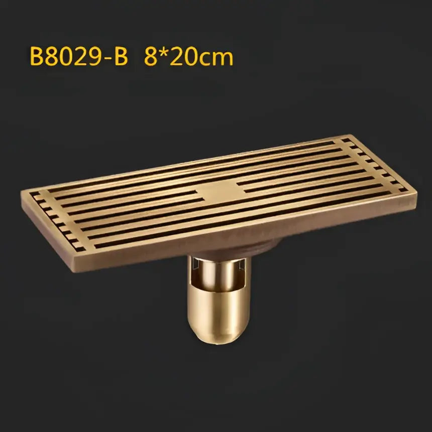 Decorbites antique brass linear floor drain with brass rectangular slatted shower drain and cylindrical mounting base