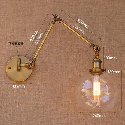 Decorbites antique brass wall lamp with adjustable swing arm and spherical glass globe housing filament bulb