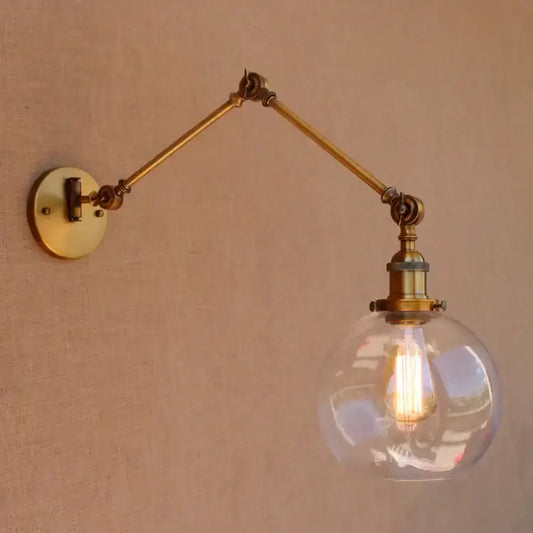 Decorbites antique brass swing arm wall lamp with adjustable brass sconce and clear glass globe housing exposed bulb