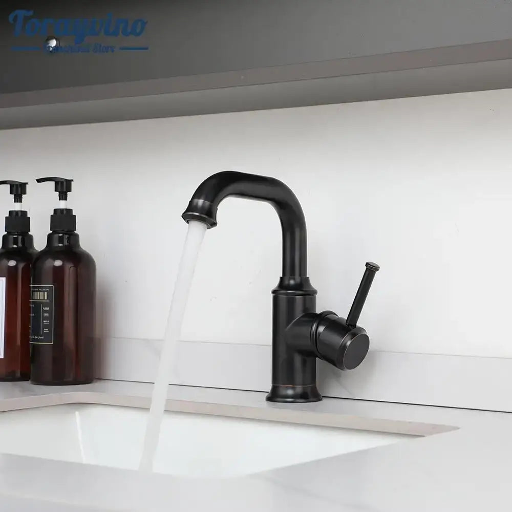 Decorbites™ bathroom faucet in black matte finish with curved spout and single lever handle brass oil rubbed design