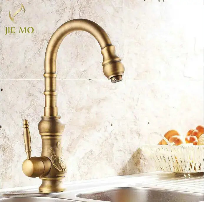 Decorbites antique brass porcelain basin mixer kitchen faucet with ornate detailing and 360 degree swivel spout