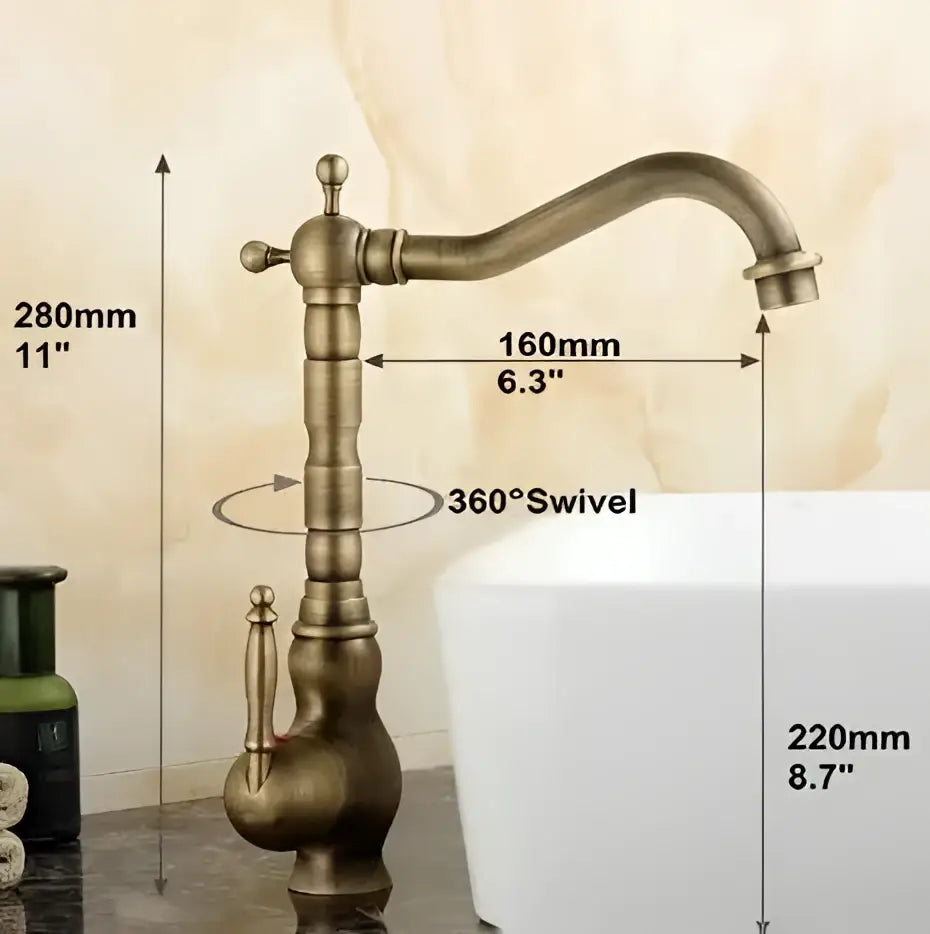 Decorbites antique brass porcelain basin mixer with 360 degree swivel spout and ornate segmented design faucet