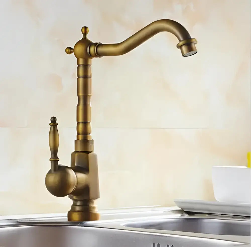 DecorBites antique brass porcelain basin mixer kitchen faucet with ornate vintage design and 360 degree swivel spout
