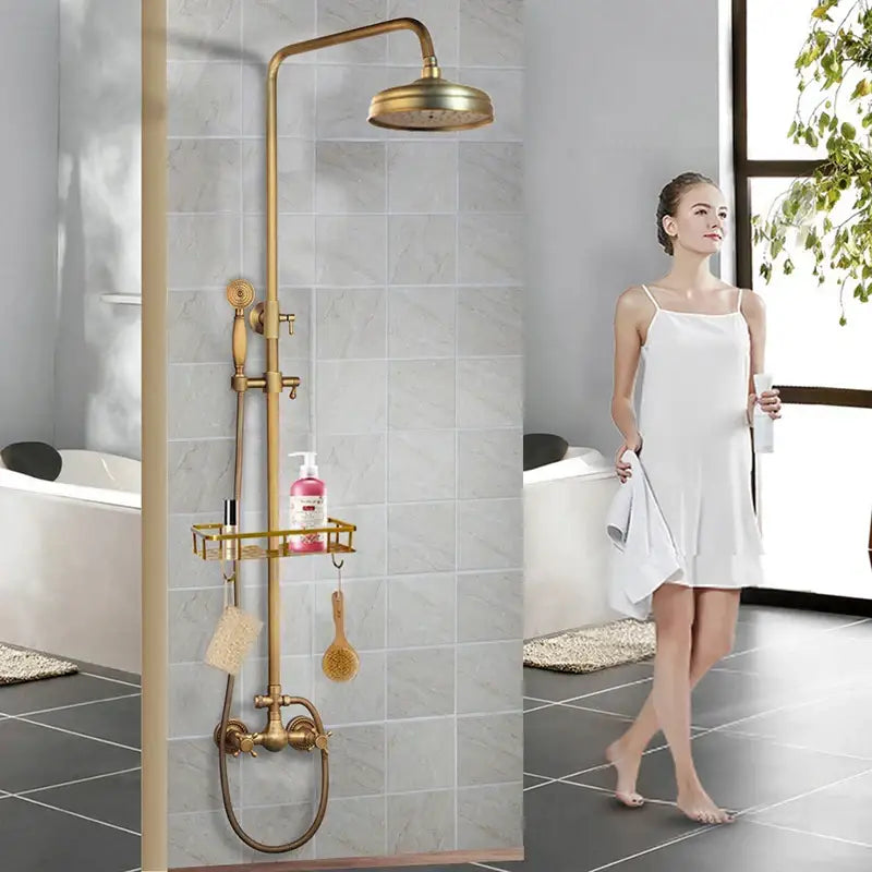 DecorBites™ antique brass shower faucet set with round rainhead, handheld sprayer, and integrated shelf for toiletries
