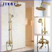 Decorbites antique brass rainfall shower faucet set with gold-finished brass rainhead handheld spray and ceramic valve handles