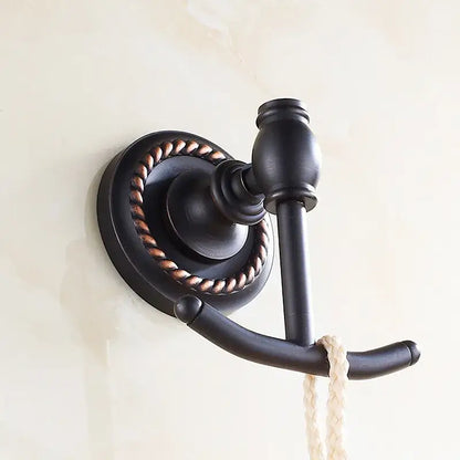 Decorbites antique brass robe hook featuring a bronze finish with rope-wrapped base and dual hooks for towels