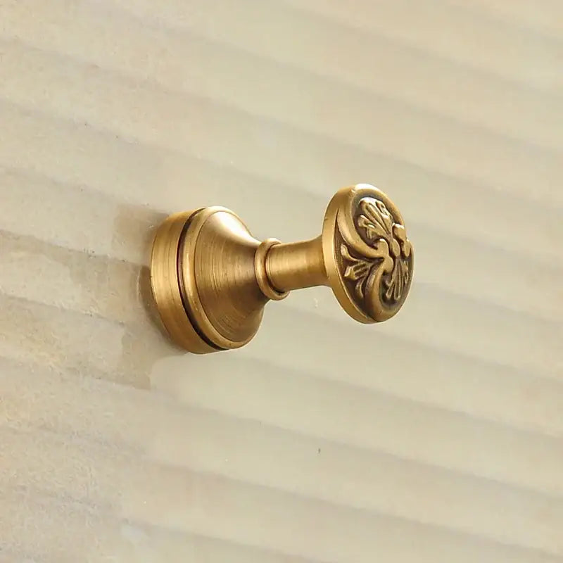 DecorBites antique brass robe hook with ornate leaf engraving designed as a brass robe hook for clothes and towels