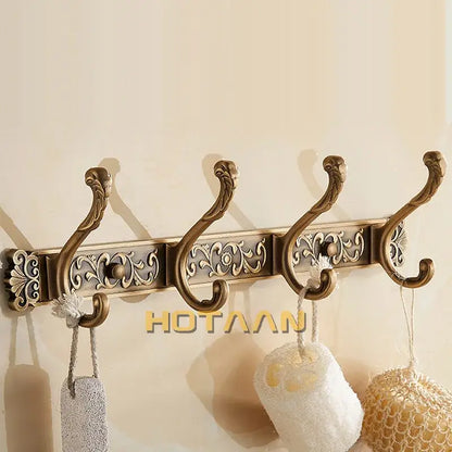Decorbites antique brass robe hook with ornate floral and scrollwork detailing wall mounted towel holder
