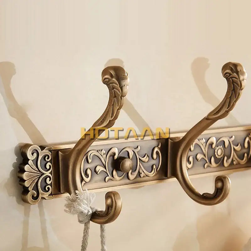 DecorBites antique brass robe hook towel holder wall mount with ornate scrollwork and floral detailing