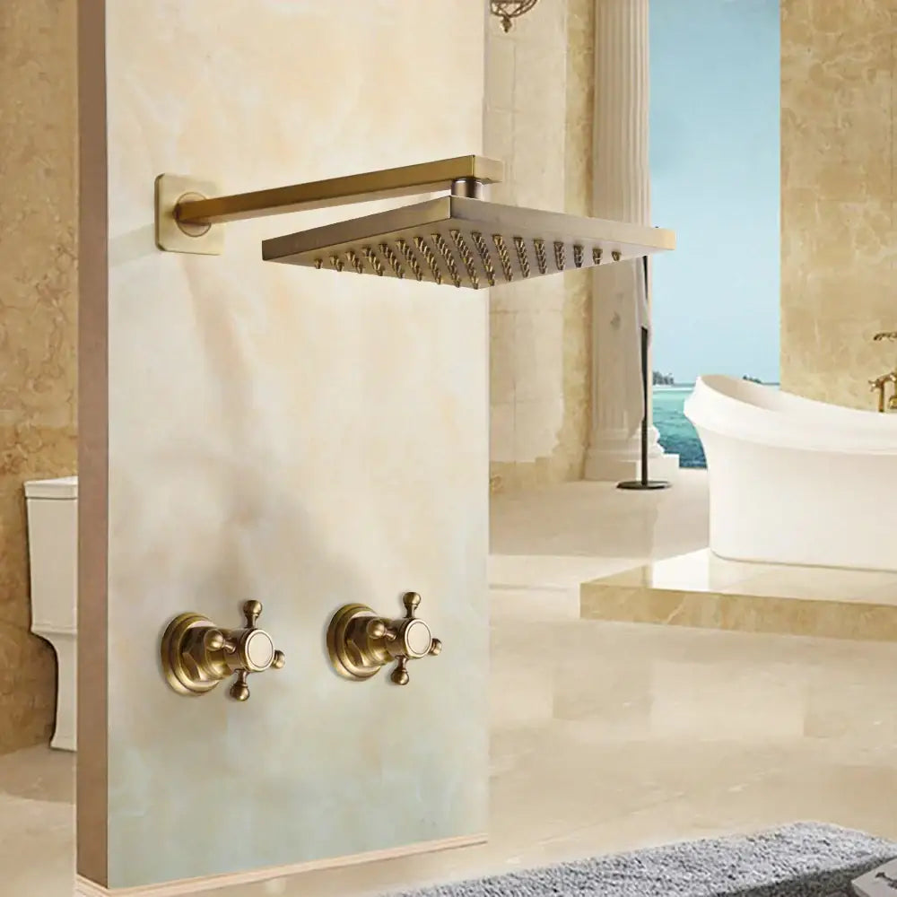 Brass square rain shower head with textured surface and matching brass handles in DecorBites antique brass shower faucet set