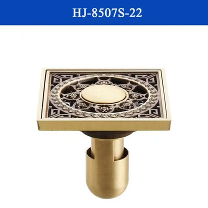 Decorbites antique brass shower drain cover featuring intricate floral and geometric embossing on brass shower drain