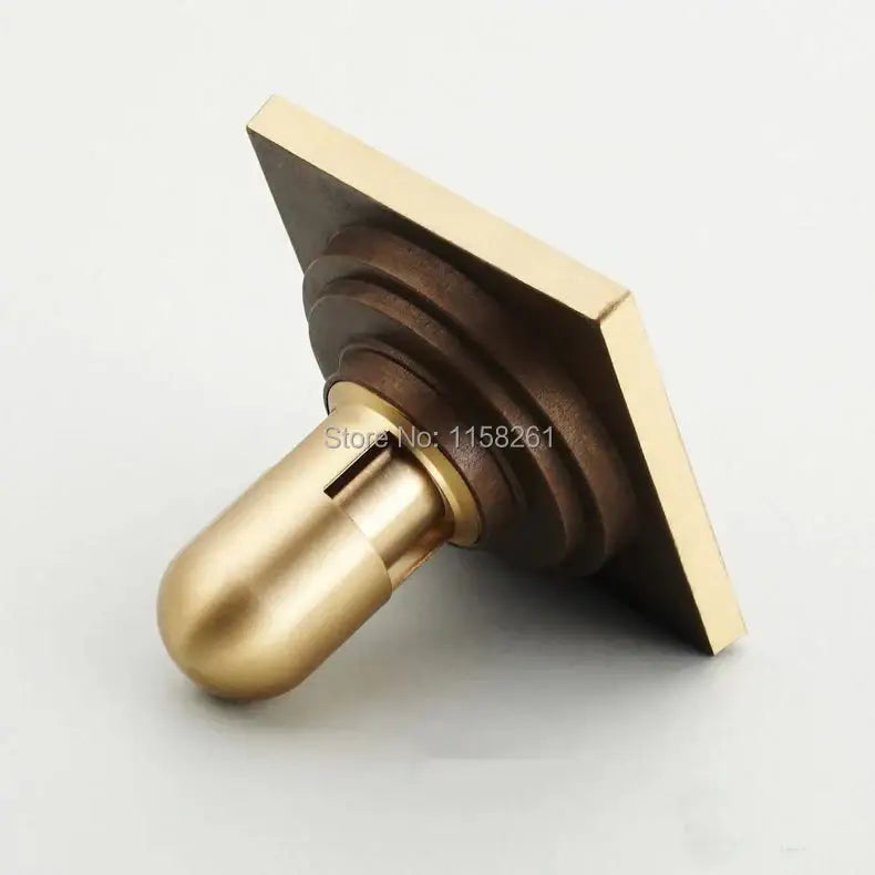 Decorbites antique brass shower drain cover with brass finish square design and concentric circular ridges for bathroom use