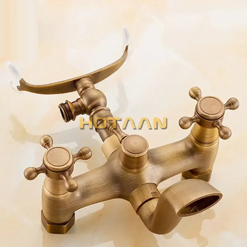 DecorBites antique brass shower faucet kit with brass finish, cross handles, and curved handheld showerhead