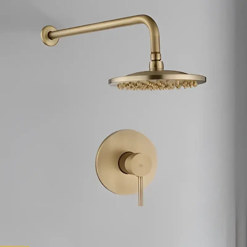 Brass-finished DecorBites™ shower faucet set with 10 inch round head and matching control valve in antique brass finish
