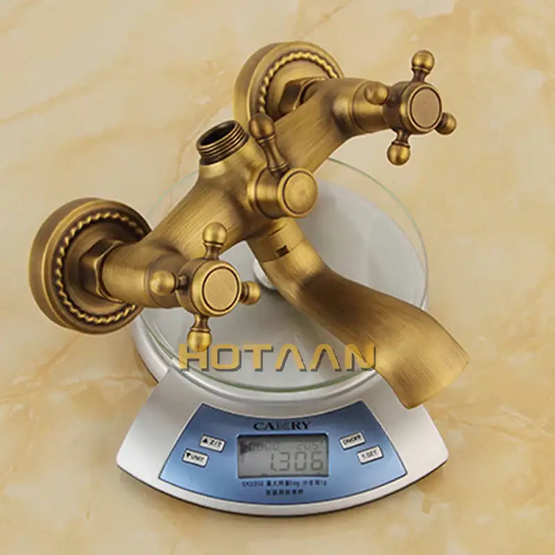 DecorBites antique brass shower faucet set with vintage-style cross handles and decorative fluted wall plates