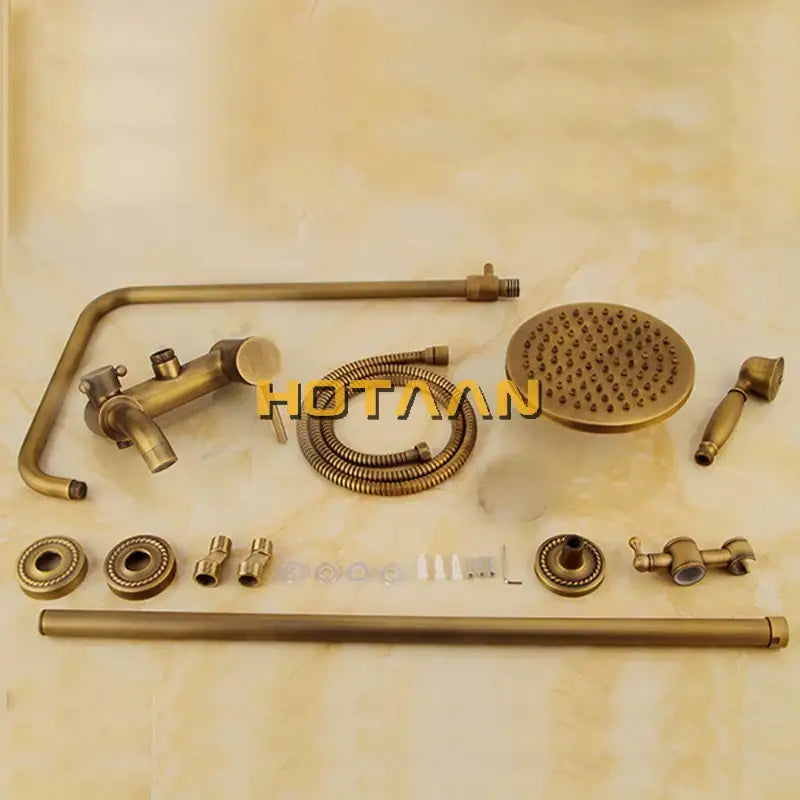 Decorbites antique brass shower faucet set with round rainhead handheld sprayer and curved pipe in brass finish