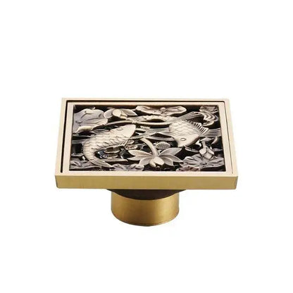 Decorbites antique brass shower floor drain with intricate fish and lotus flower engraved design 10cm square grate
