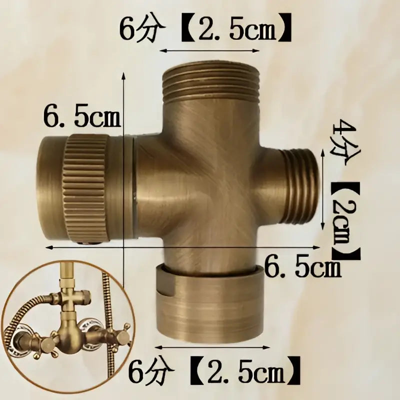 Brass-colored t-shaped plumbing connector with threaded ends and measurement markings for antique brass shower set installation