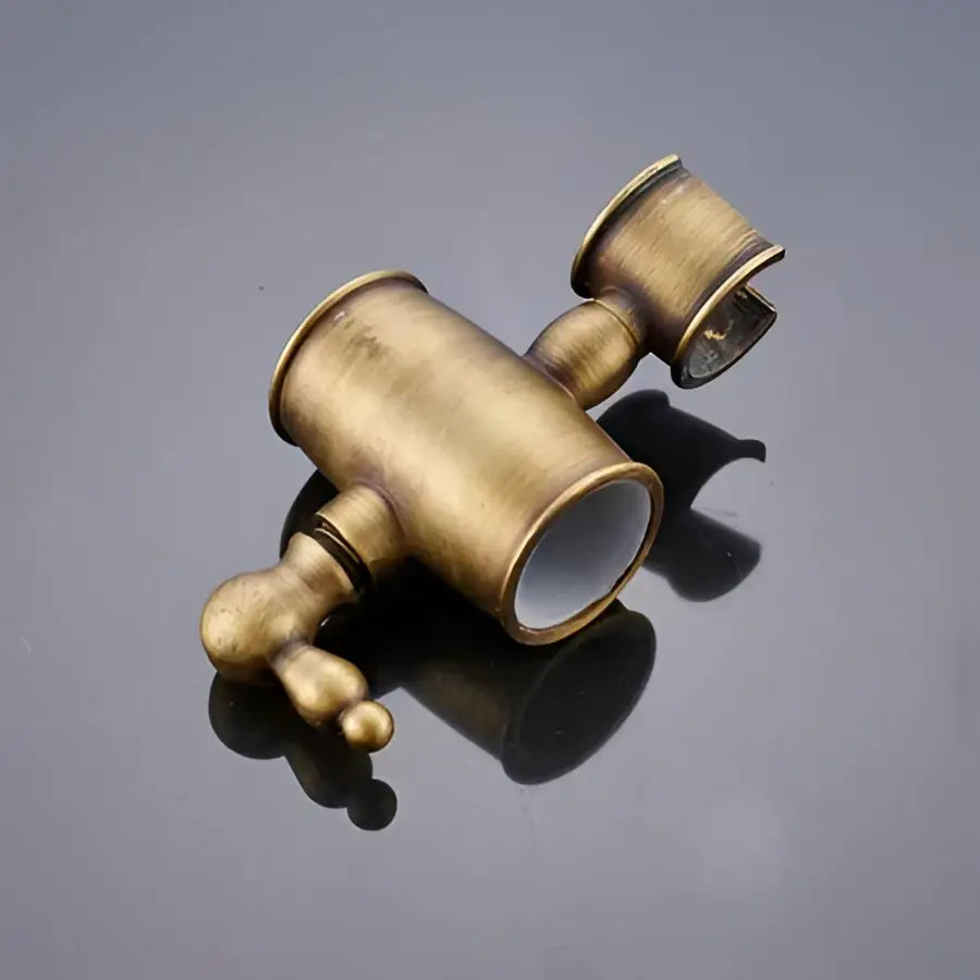 Decorbites™ antique brass shower set with 3-way diverter features an ornate antique brass faucet handle with dual spouts