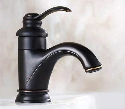 Decorbites™ antique brass single handle deck mount bathroom sink faucet with black matte curved spout and arched handle